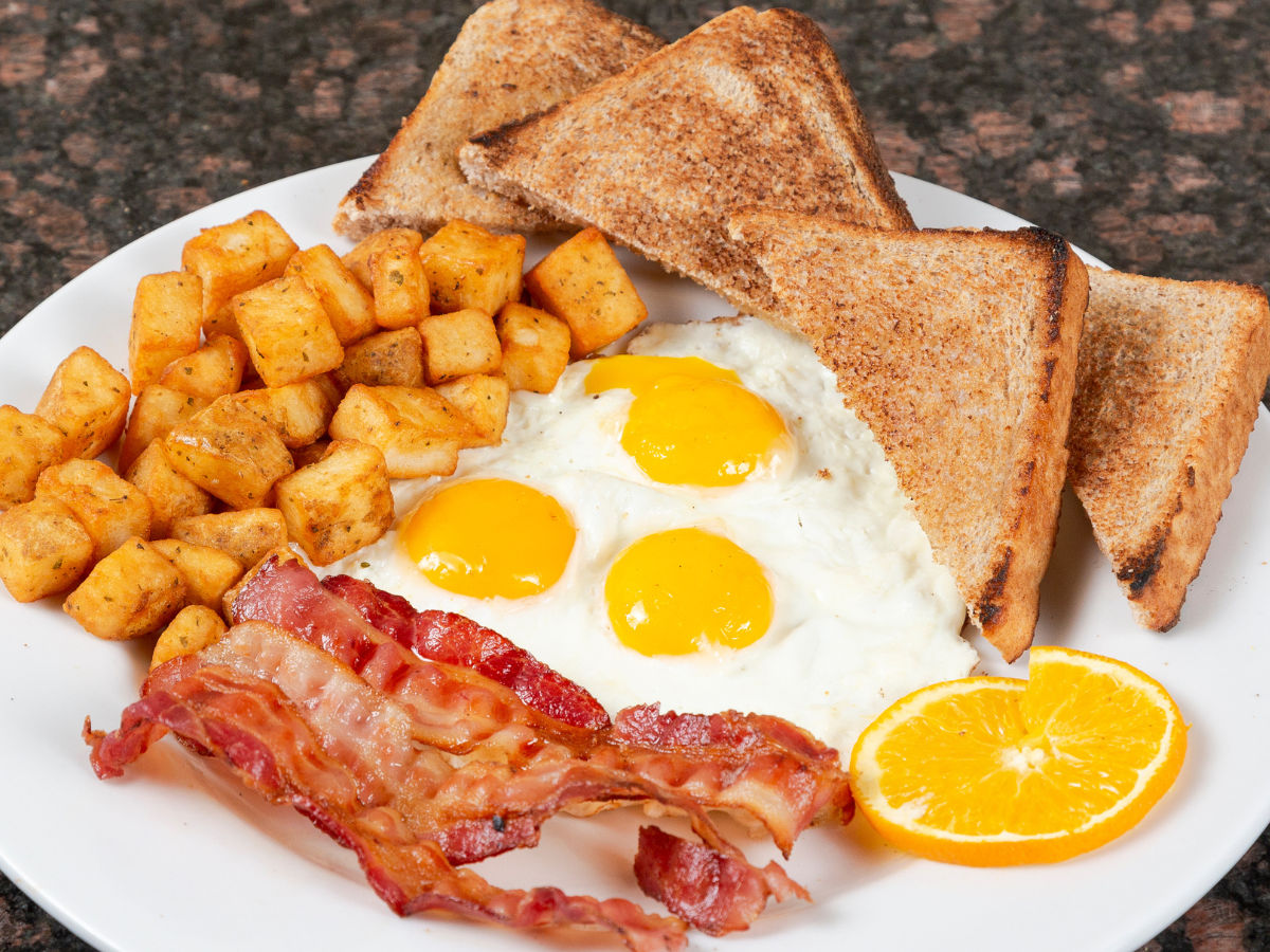 Three Eggs Breakfast Potatoes Toast & Bacon