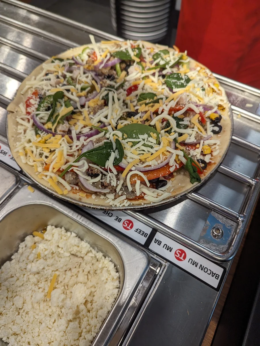Unlimited Toppings Thin Crust Pizza