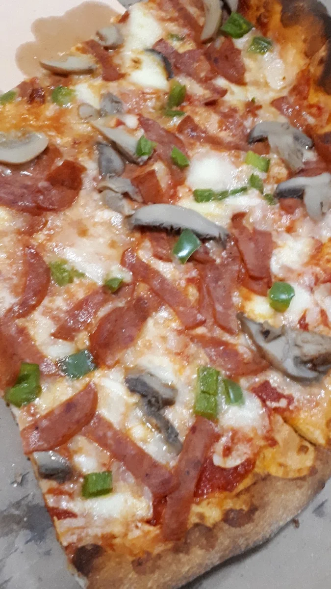 Highlights, Zaza's Pizzeria Inc
