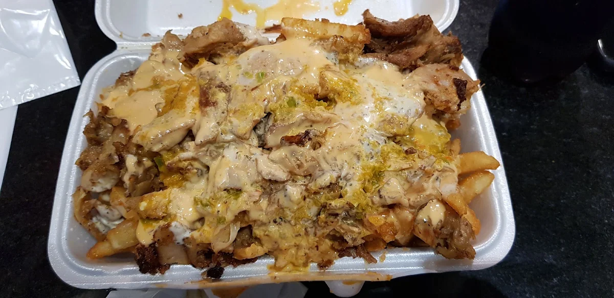 Shwarma Poutine with Garlic and Home Made Hot Sauce