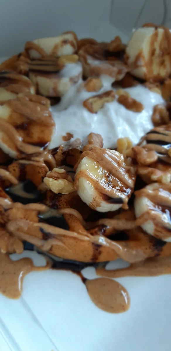 Peanut Butter Banana Waffle with Coconut Whip and Maple Syrup