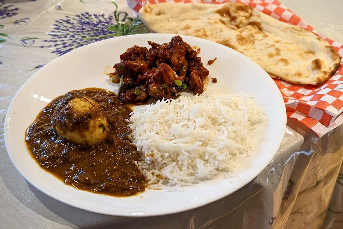 Egg Pulusu Chili Chicken Butter Naan