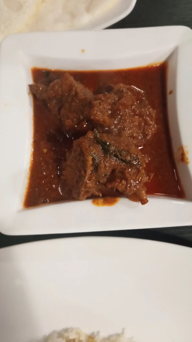 Thattu Dosa & Chicken Curry Combo