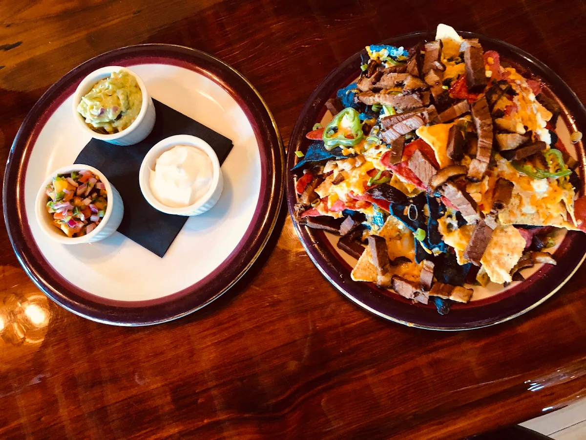 Skeena Nachos Served with Smoked Sour Cream and Salsa