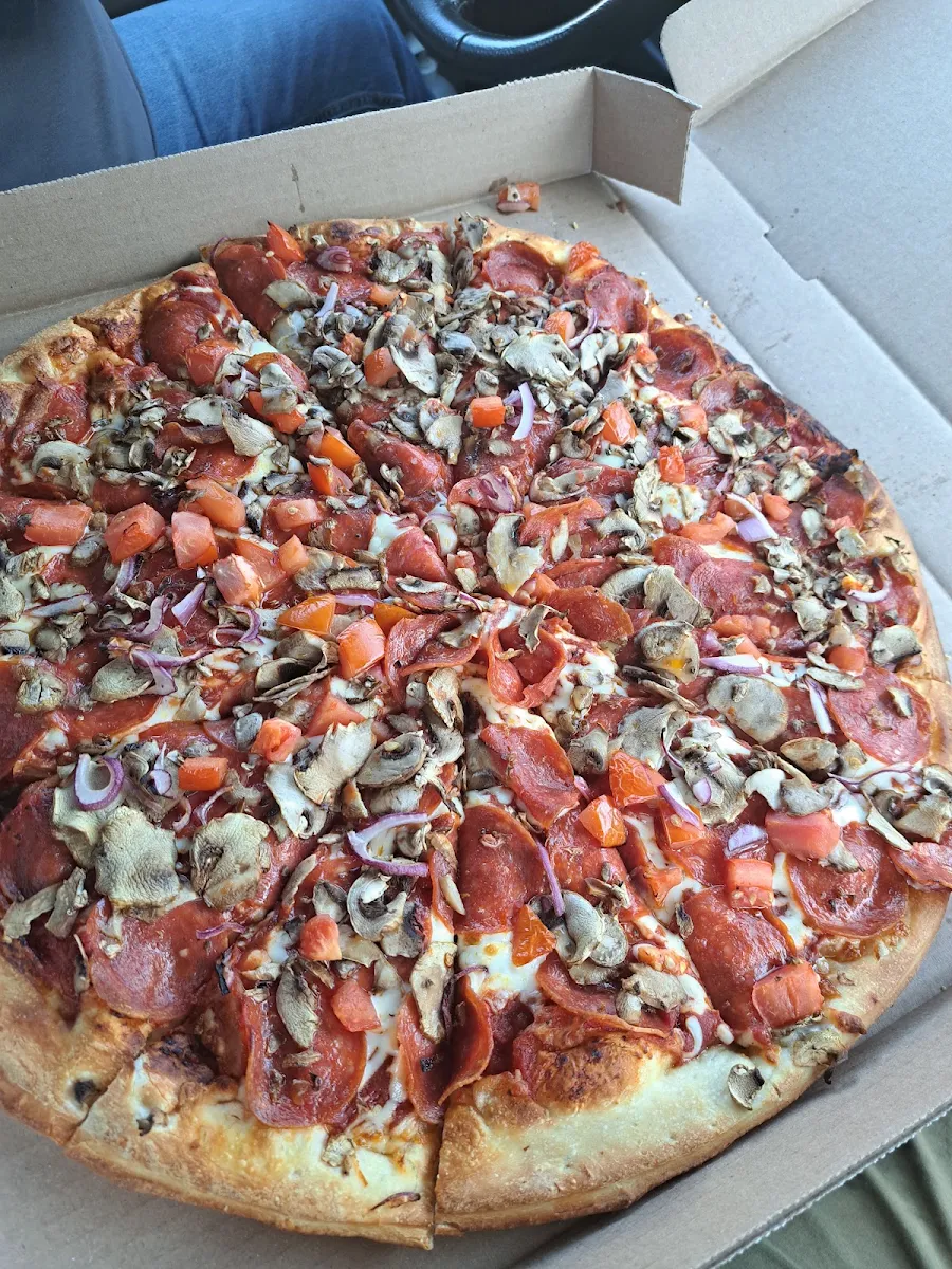 Pepperoni Pizza with Mushroom Onions Tomatoes