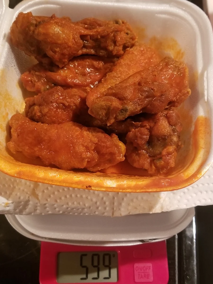 Approximately 1 2 lb of a Supposed 1lb Order of Medium Hot Wings