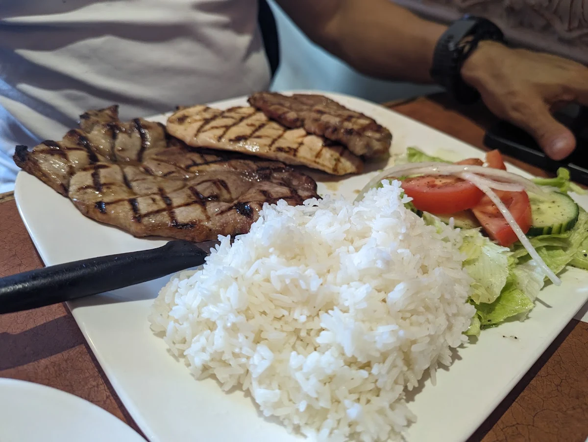 Grilled Pork Chops and Chicken with Rice and Salad