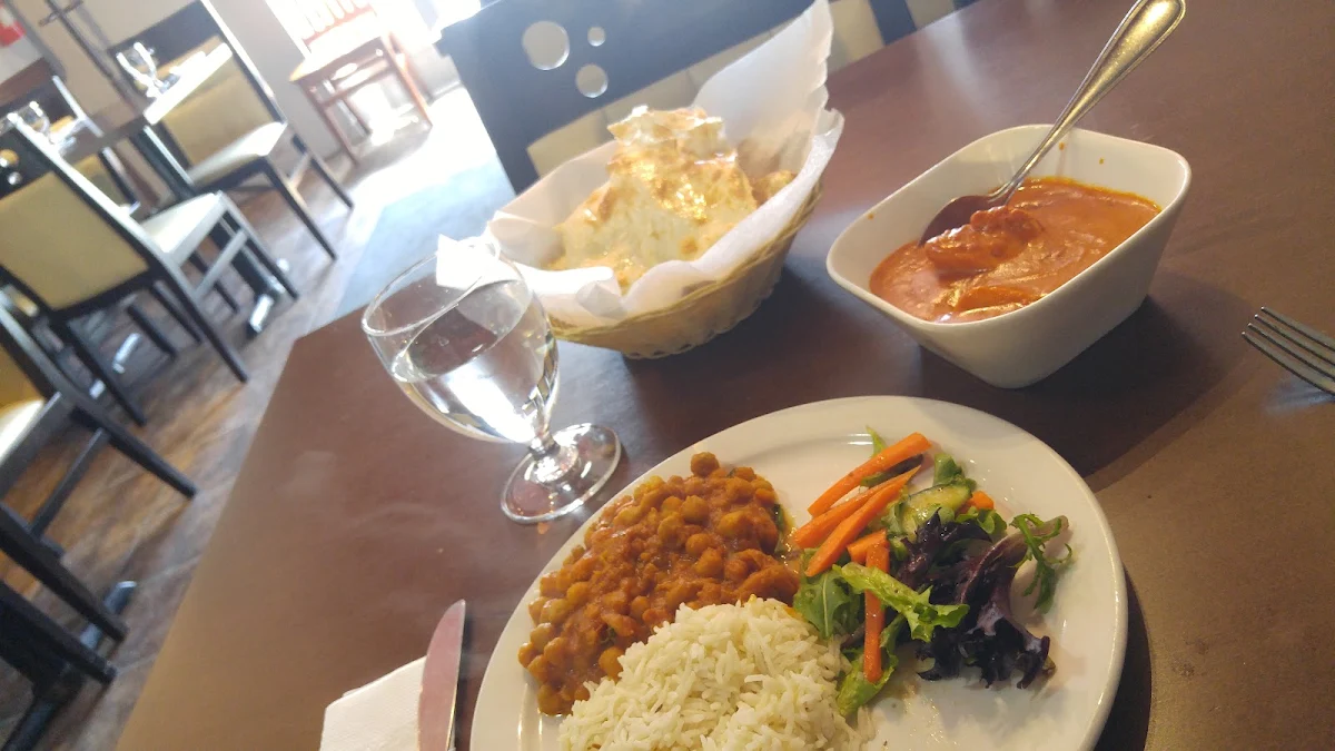 Lunch Special Butter Chicken with Rice Salad Chickpea and Naan
