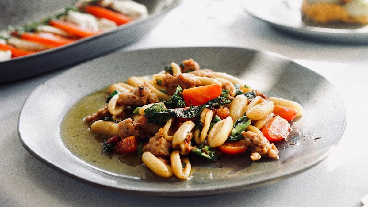 Cavatelli with Sausage Rapini Cherry Tomatoes and Pancetta