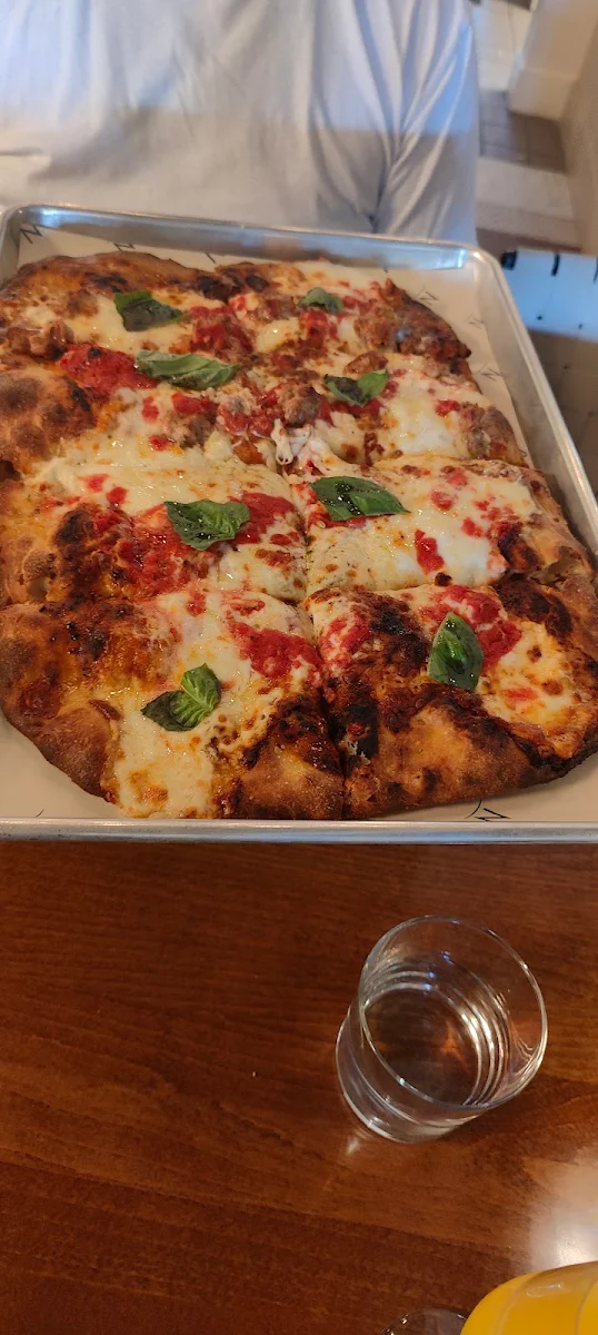 Half Margherita and Half Sausage Pizza