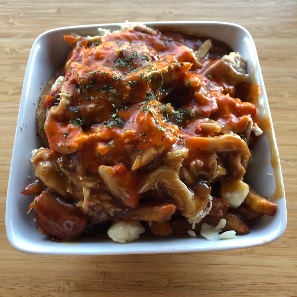 Poutine Au Porc Effiloche Avec Une Aioli A la Truffe Pulled Pork Poutine With A Truffle Aioli