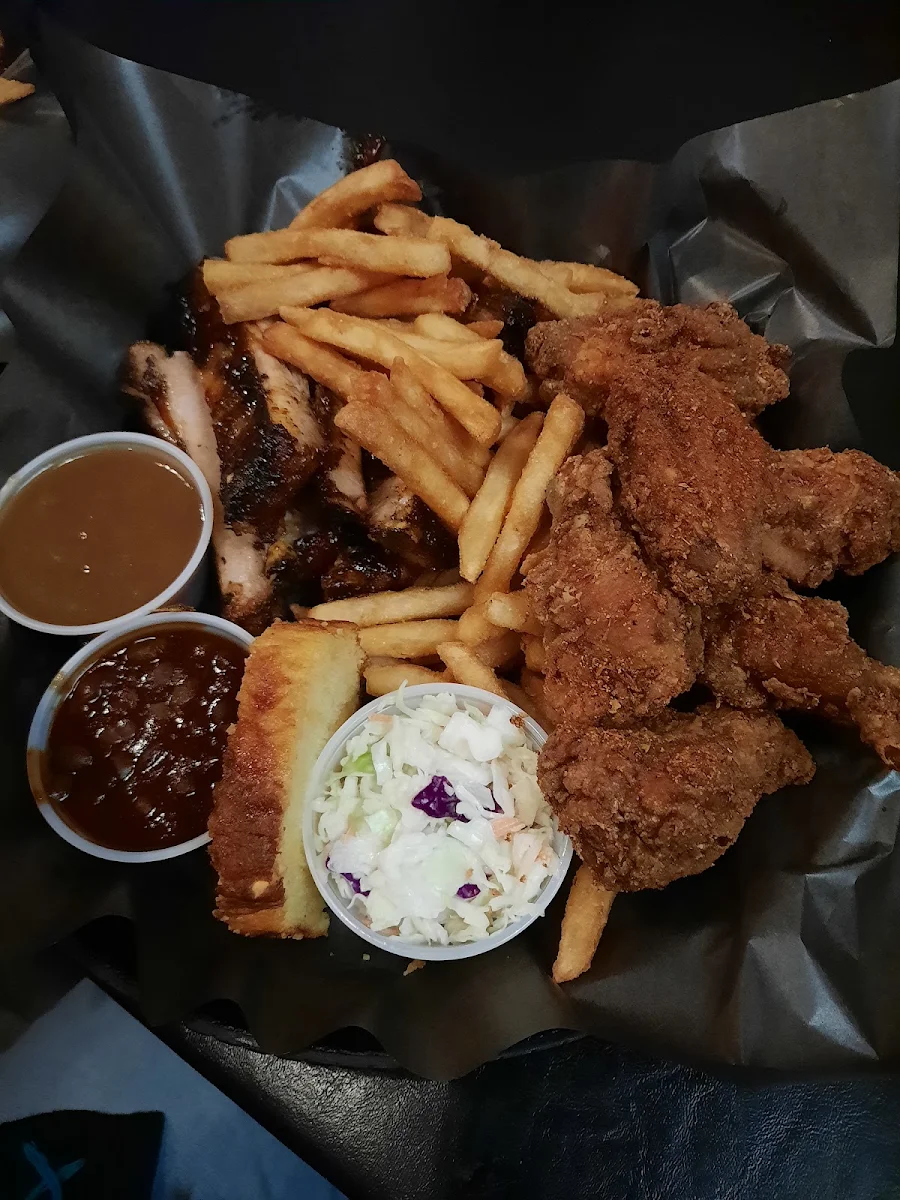 Ribs Dry Cajun Wings and Fries Comes with Corn Bread Coleslaw Baked Beans