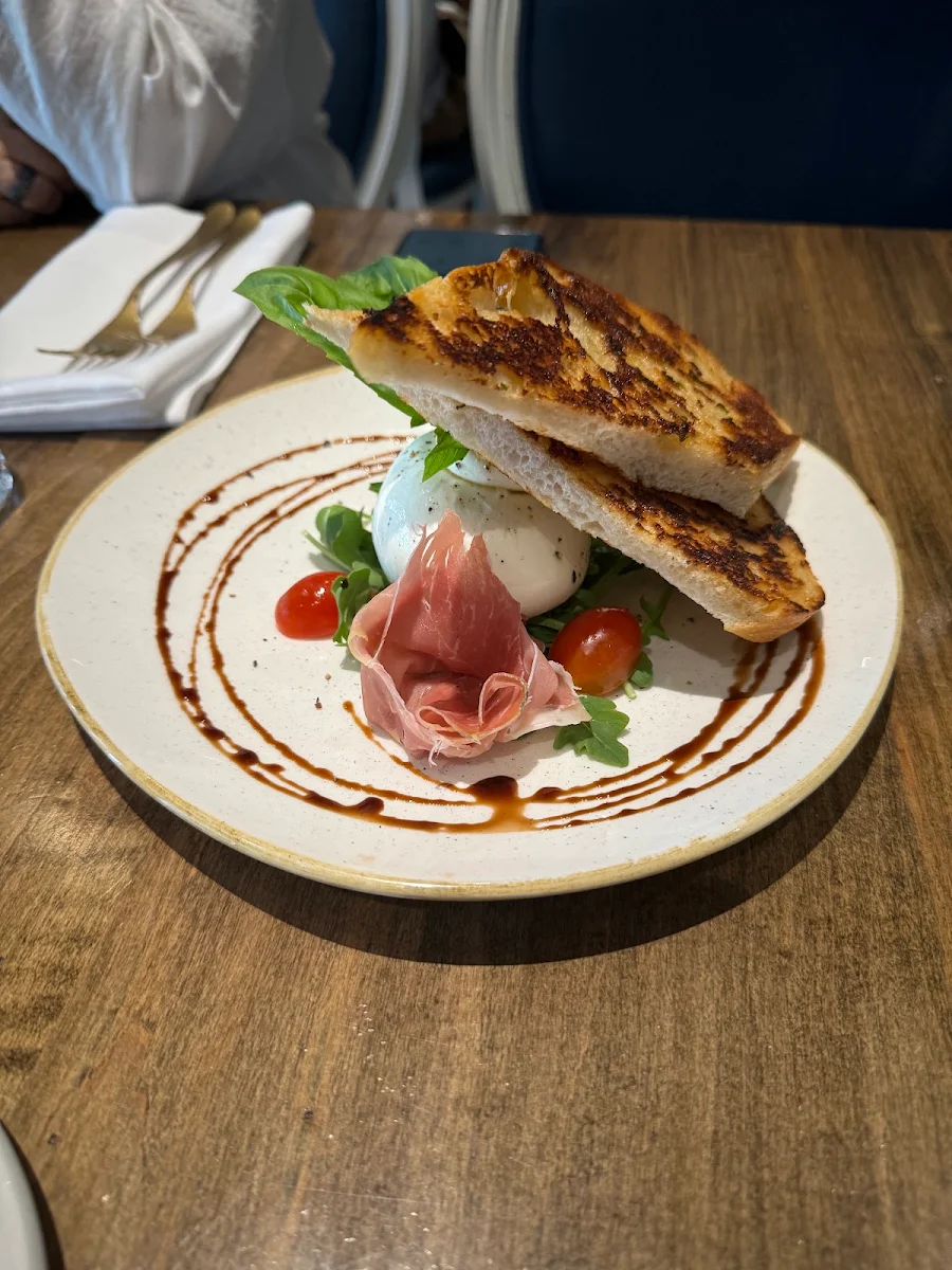 Creamy Burrata Cheese with a Pear and Jam Arugula Olive Oil Grilled Focaccia