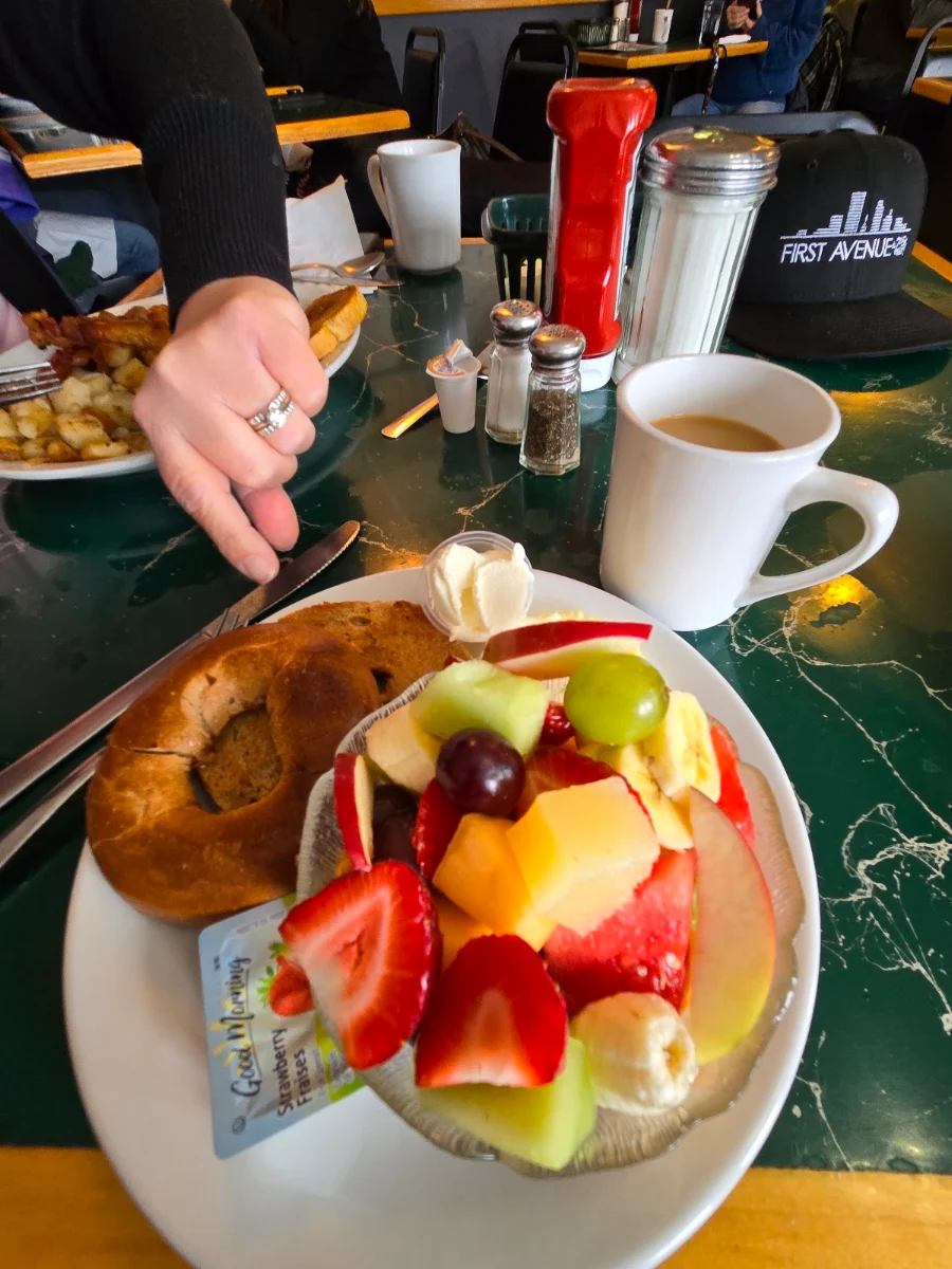 Bagel with Cream Cheese and a Fruit Bowl