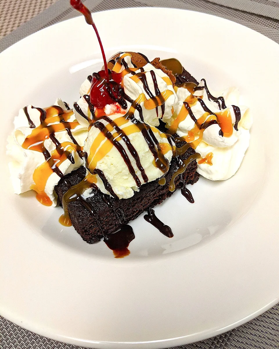 Scratch-Made Goodness Our Chocolate Brownie Delight with Chocolate and Vanilla Bean Ice Cream