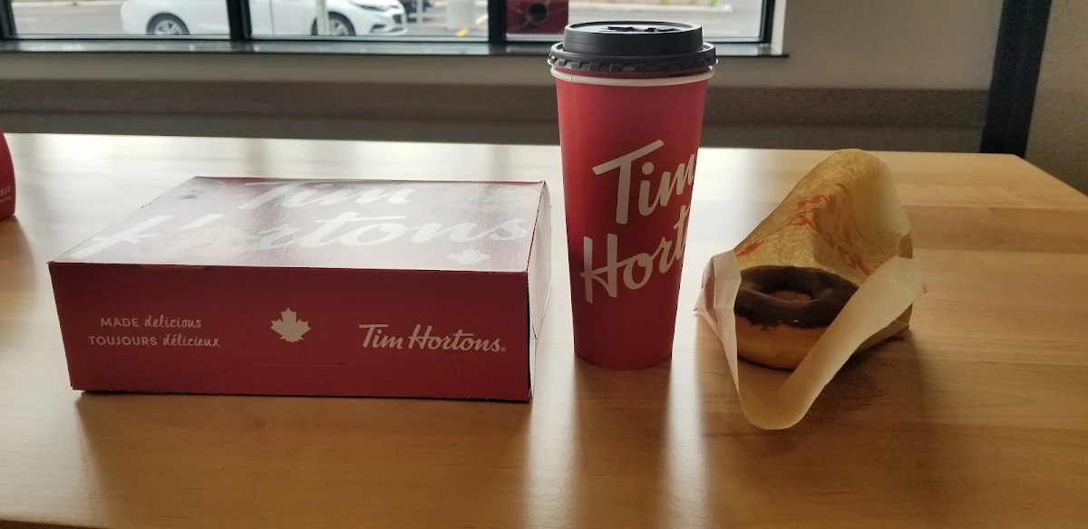Half Dozen Assorted Donuts a Coffee and a Chocolate Dip Donut