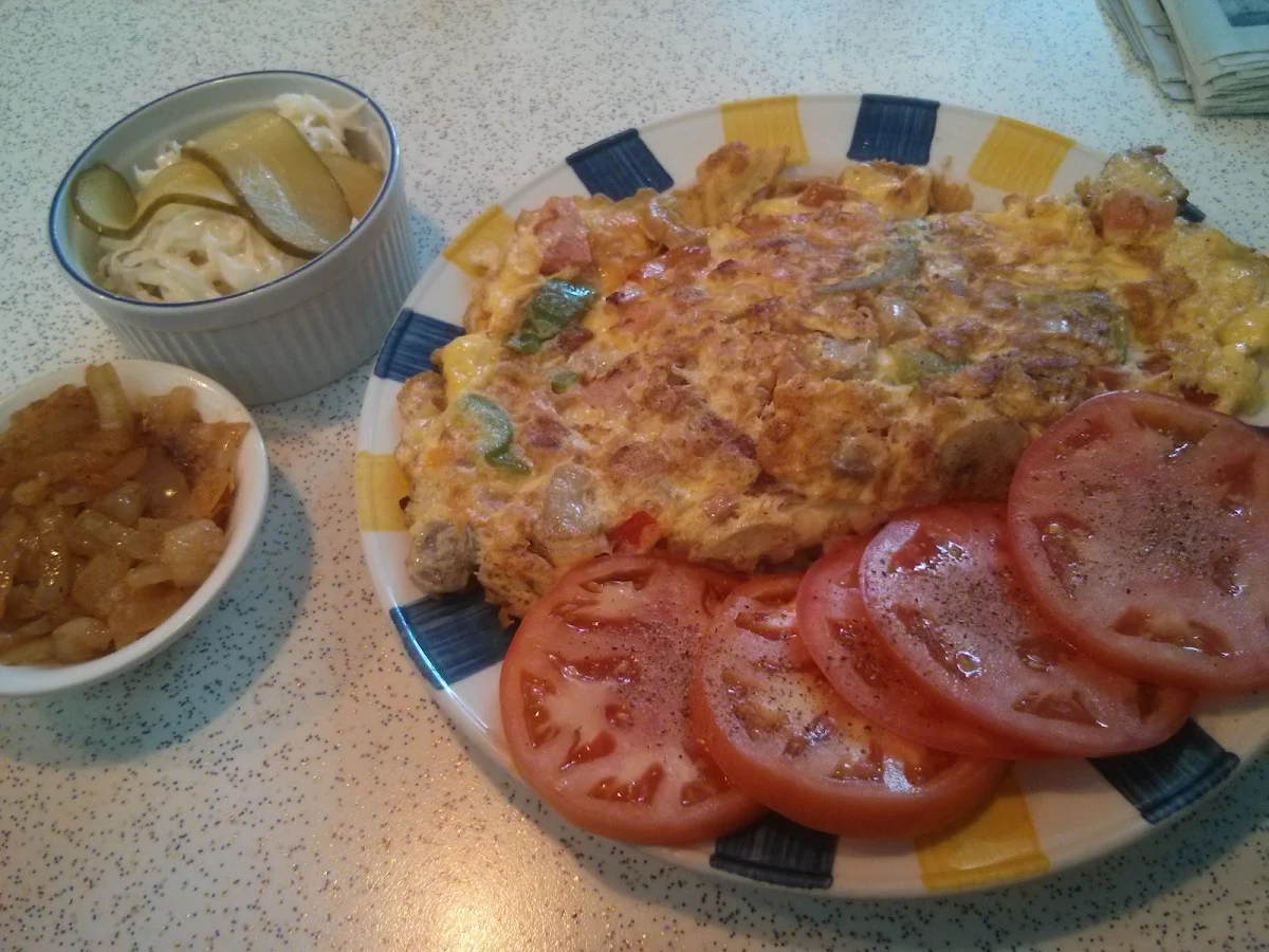 Wimpys Omlette with Tomatoes Slices Coleslaw and a Side of Fried Onions