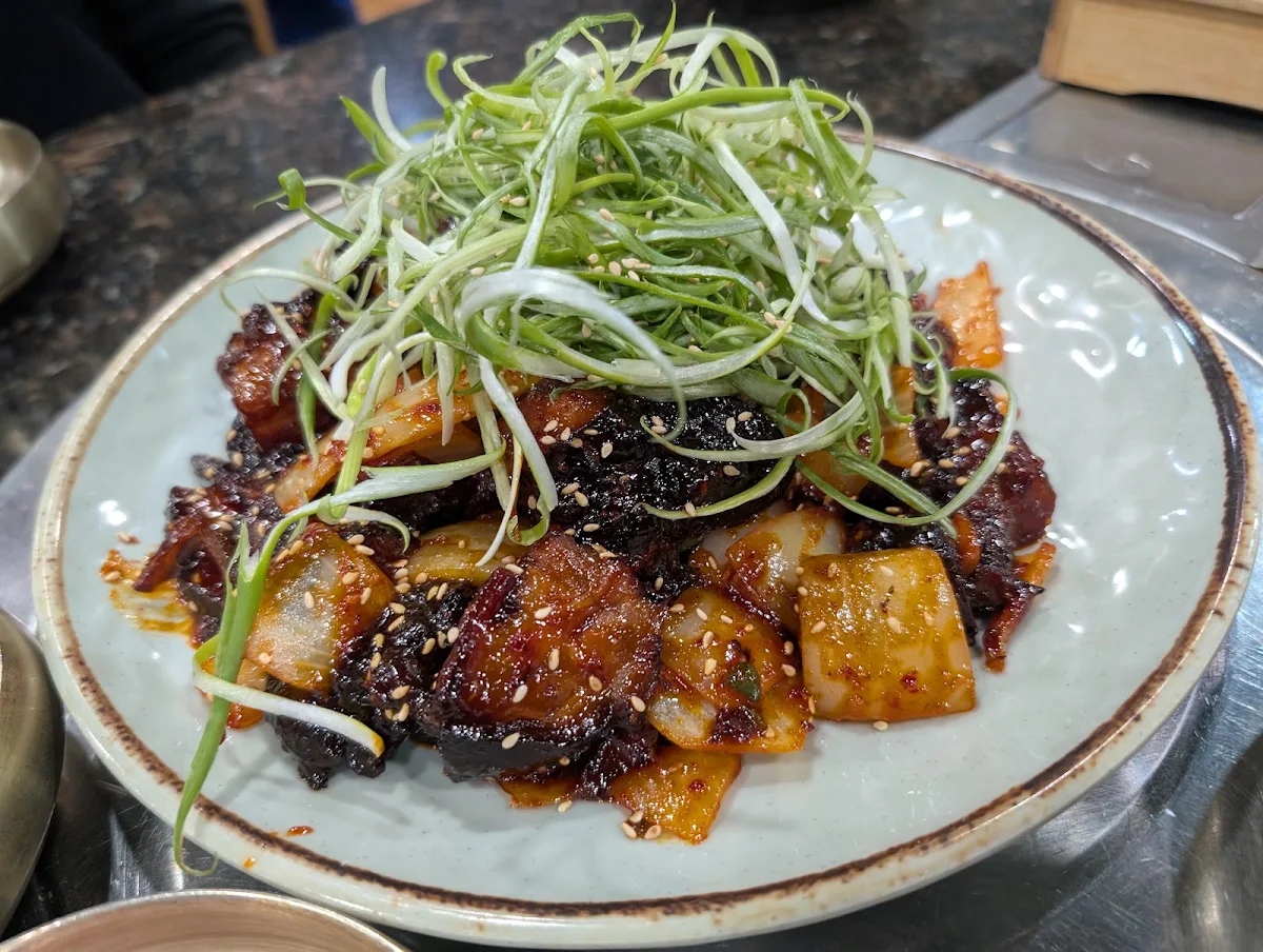 35 Stir Fried Braised Pork Trotters with Special Spicy Sauce