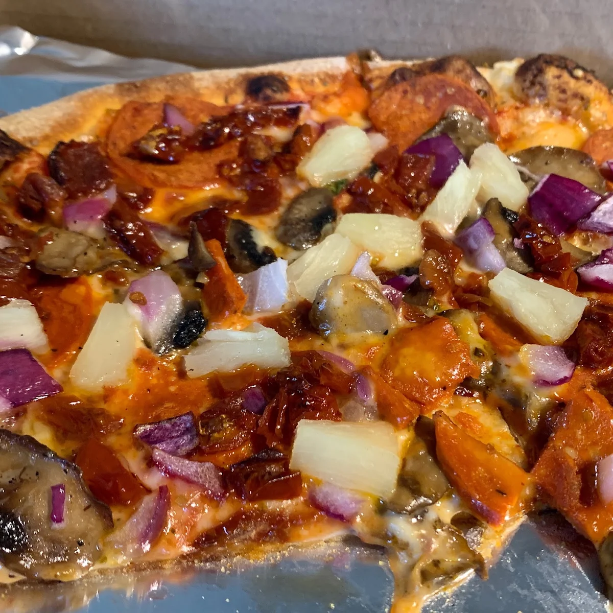 The Let’S Eat Meat Pizza