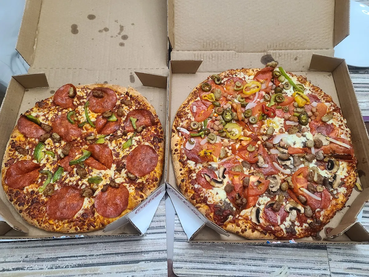 Medium Pizza 12 and Large Feast Pizza 14