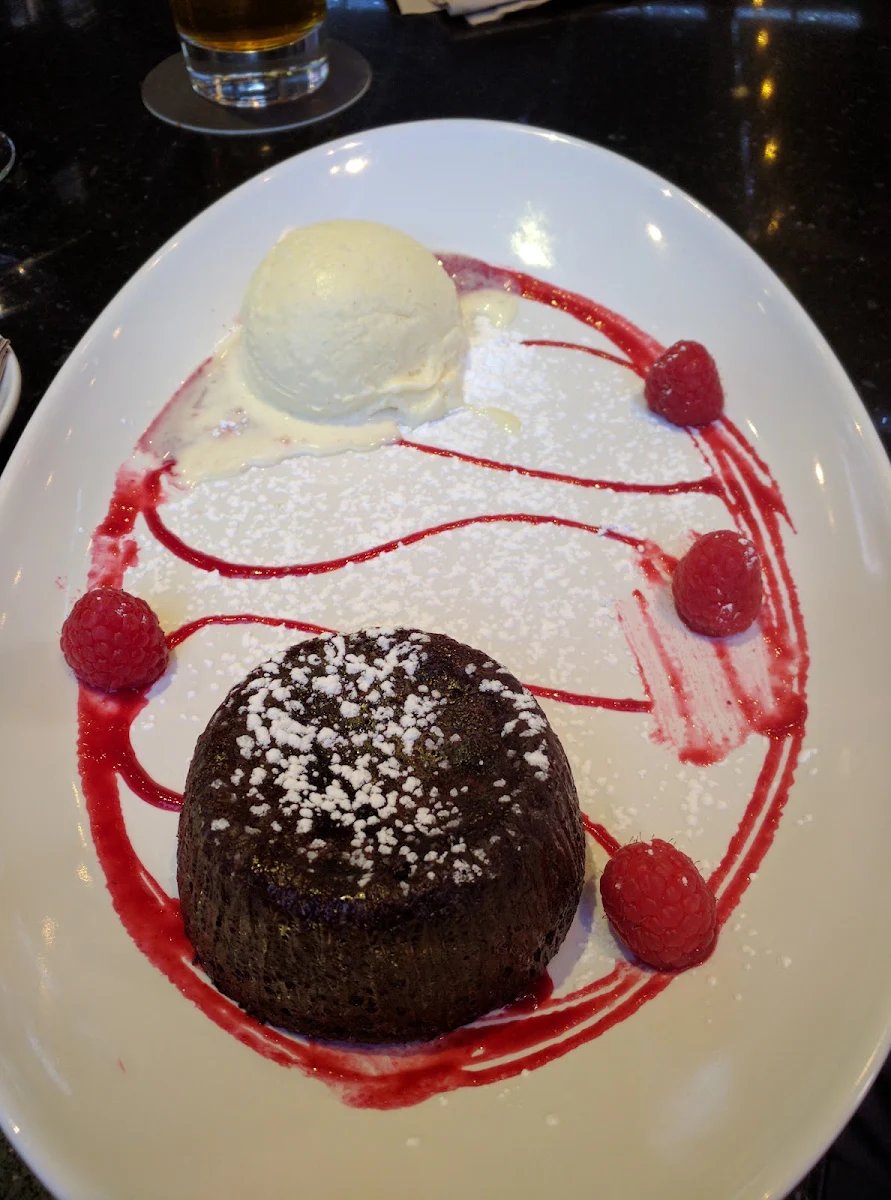 Molten Chocolate Cake Glutenwise Gluten Free Fresh Raspberries Tahitian Vanilla Ice Cream CA 13 00