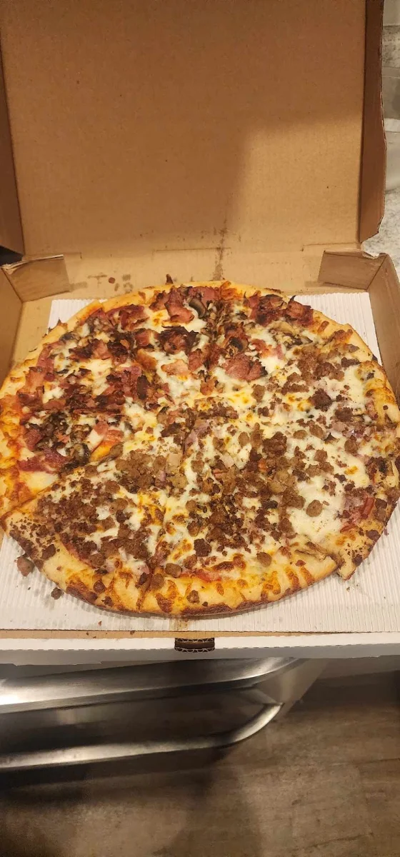 Cook Special and Meat Lovers Pizza
