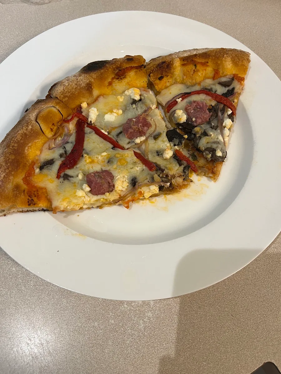 Vegetarian Pizza with Sausage Added