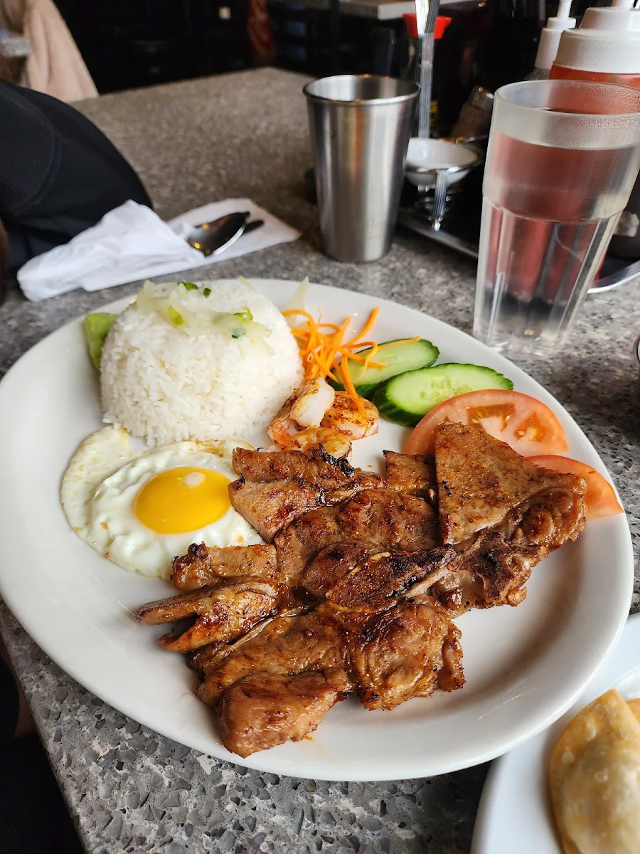 Grilled Lemongrass Pork Chop Marinated Shrimp and Fried Egg