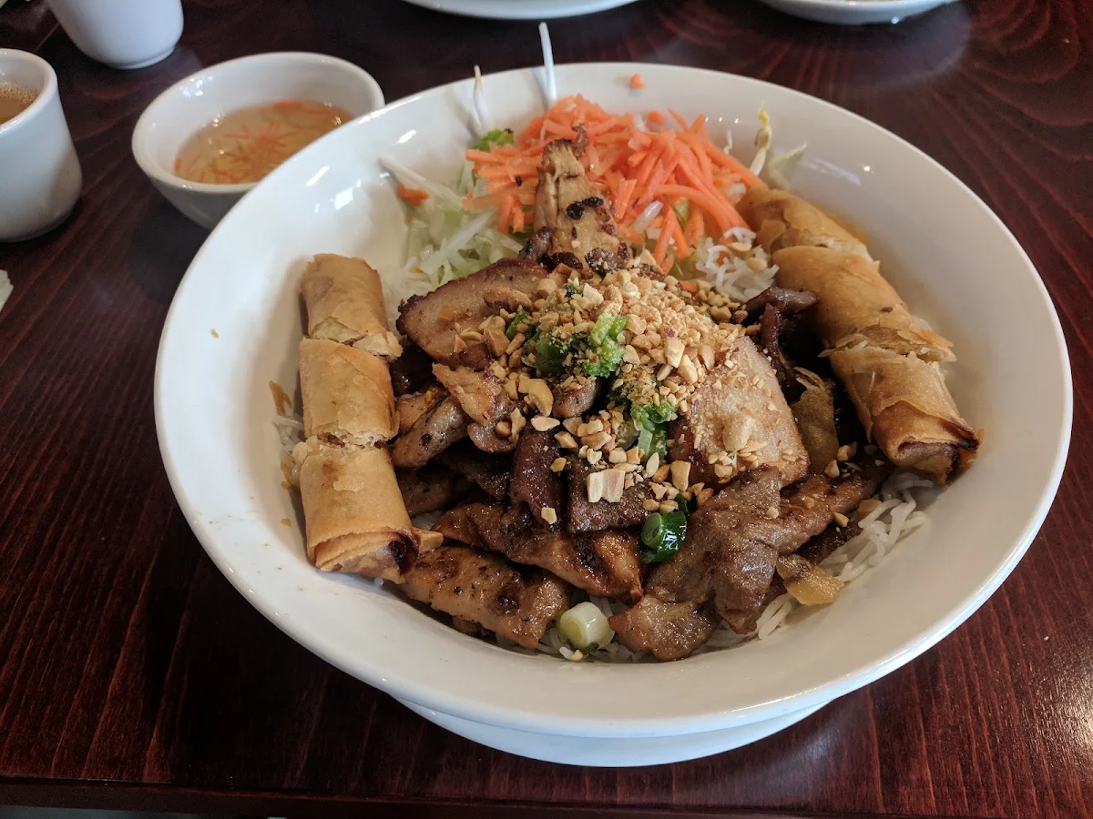 Charbroiled Pork Chicken and Beef with Pork Spring Roll on Vermicelli
