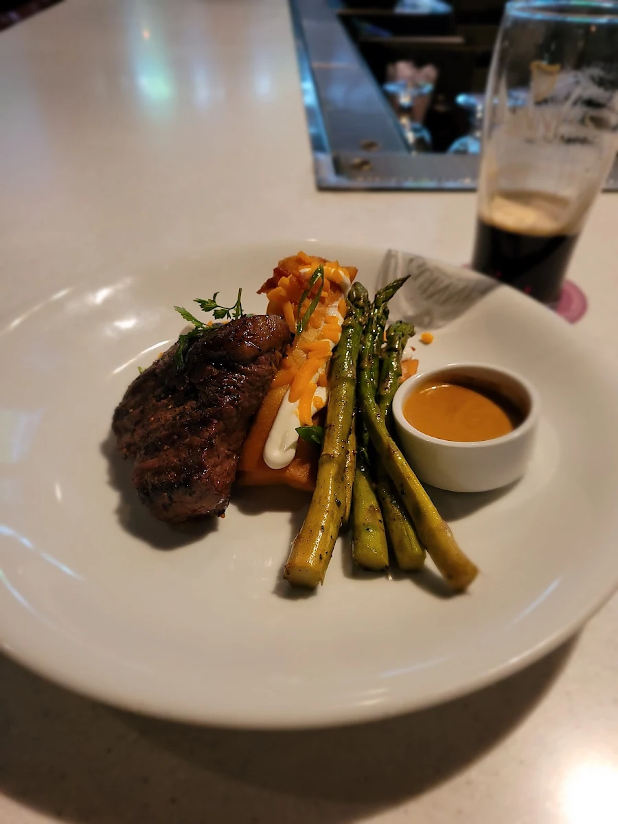 Steak with Peppercorn Sauce with Potato Fritters and Asparagus
