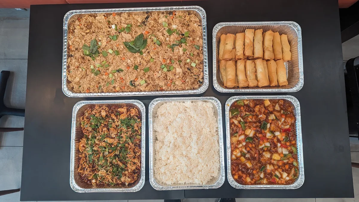 Tamarind Chili Chicken General Thairacha Basil Fried Rice and Imperial Rolls