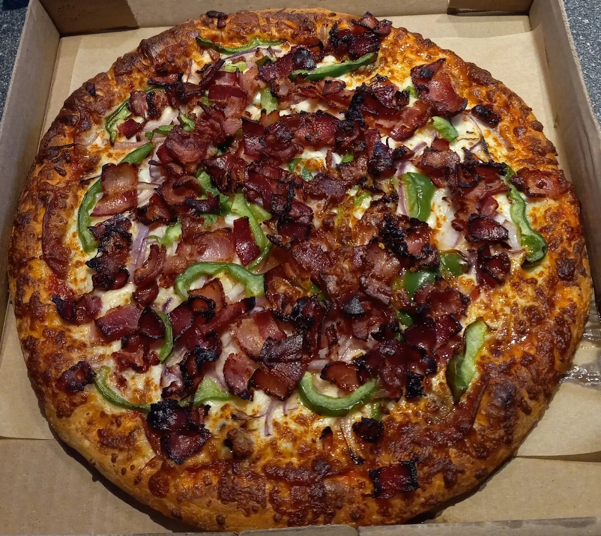 Pizza Deluxe Moyenne Mars 2023