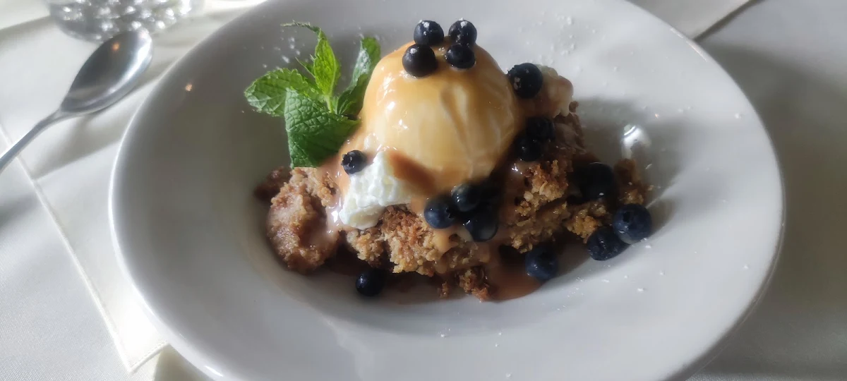Warm Apple Crumble Spiked with Screech Topped with in-House Made