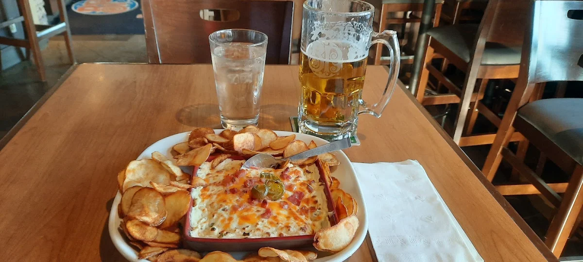 Le Bières de Heineken Avec Trempette Aux Piments Jalapenos
