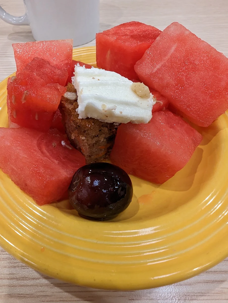 Fruit Plate with a Piece of Carrot Cake