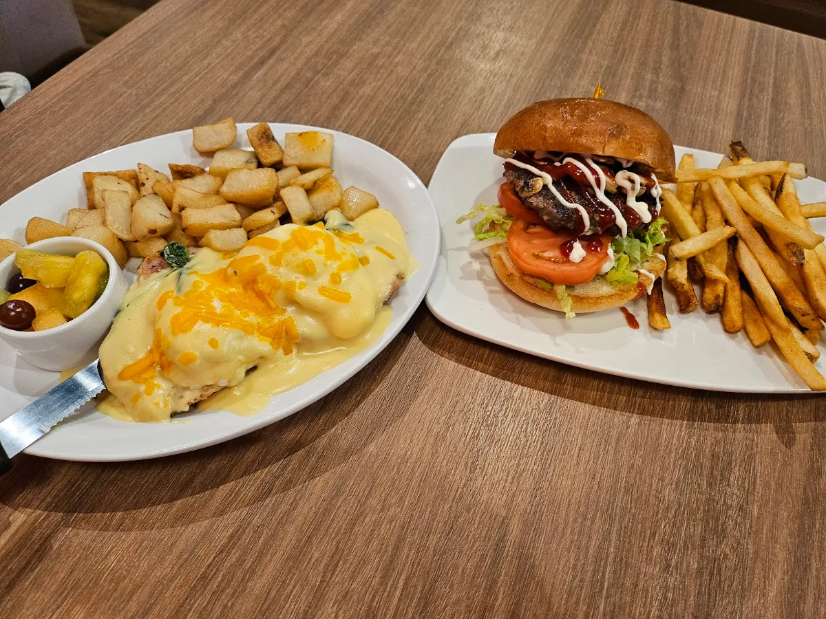 Eggs Benedict with Home Fries Country Burger with Mushroom Lettuce Tomatoes Mayo Ketchup
