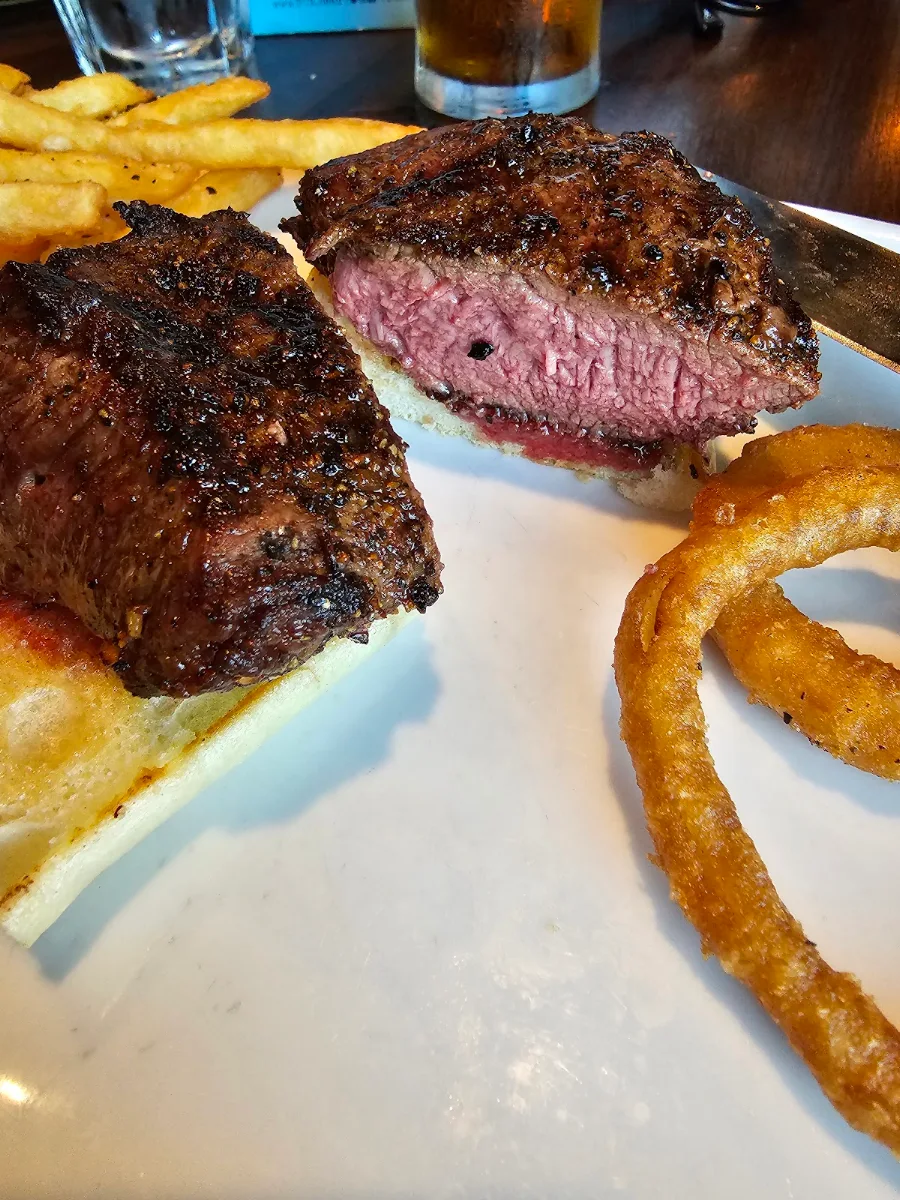 6oz Steak Sandwich with Fries and Onion Rings
