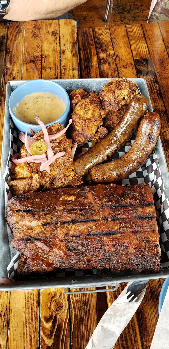 Full Rack of BBQ Ribs Pulled Pork Hot Link Sausages and Fried Chicken