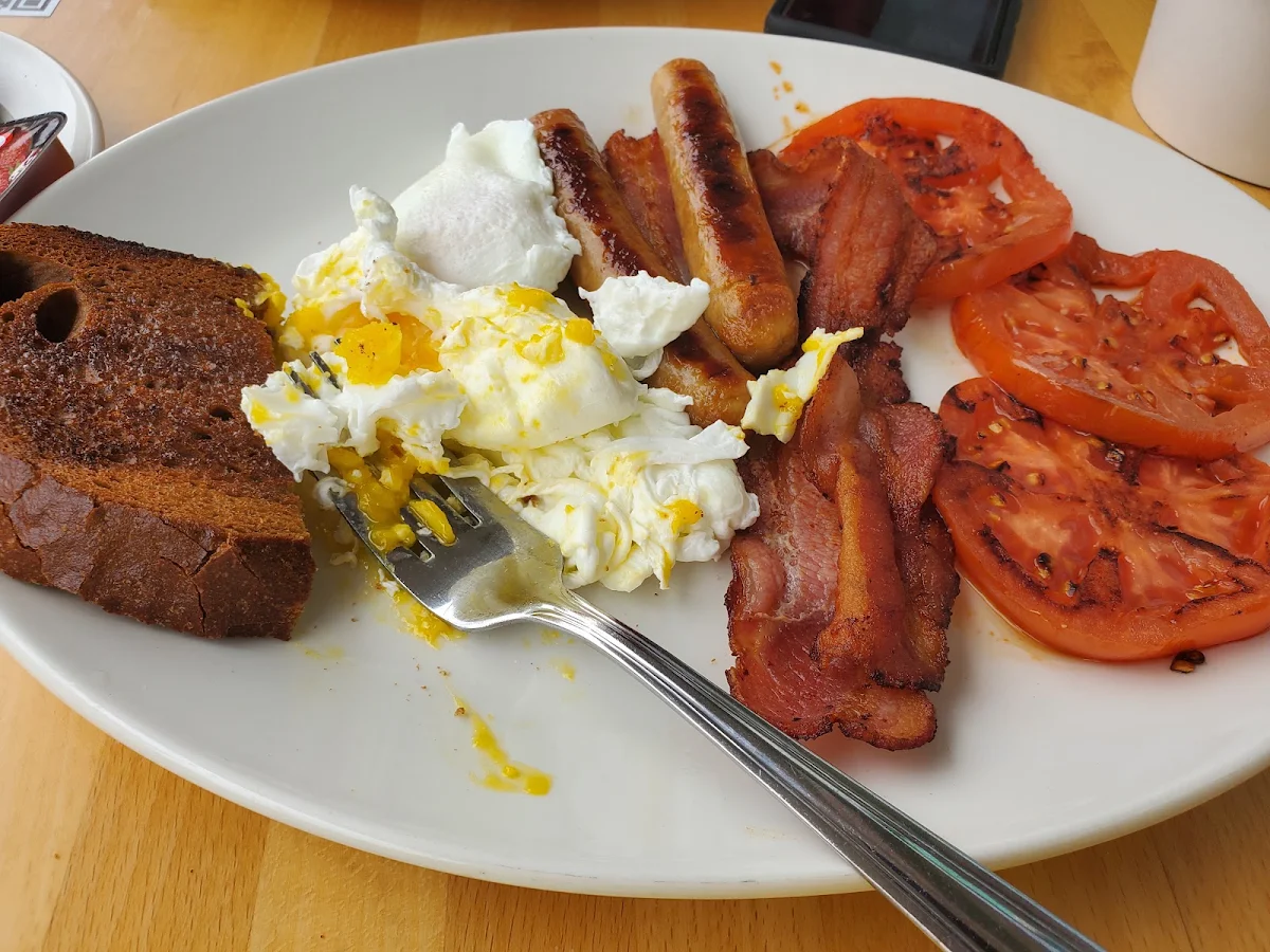 3 Poached Eggs Sausages Dark Rye with Grilled Tomatoes