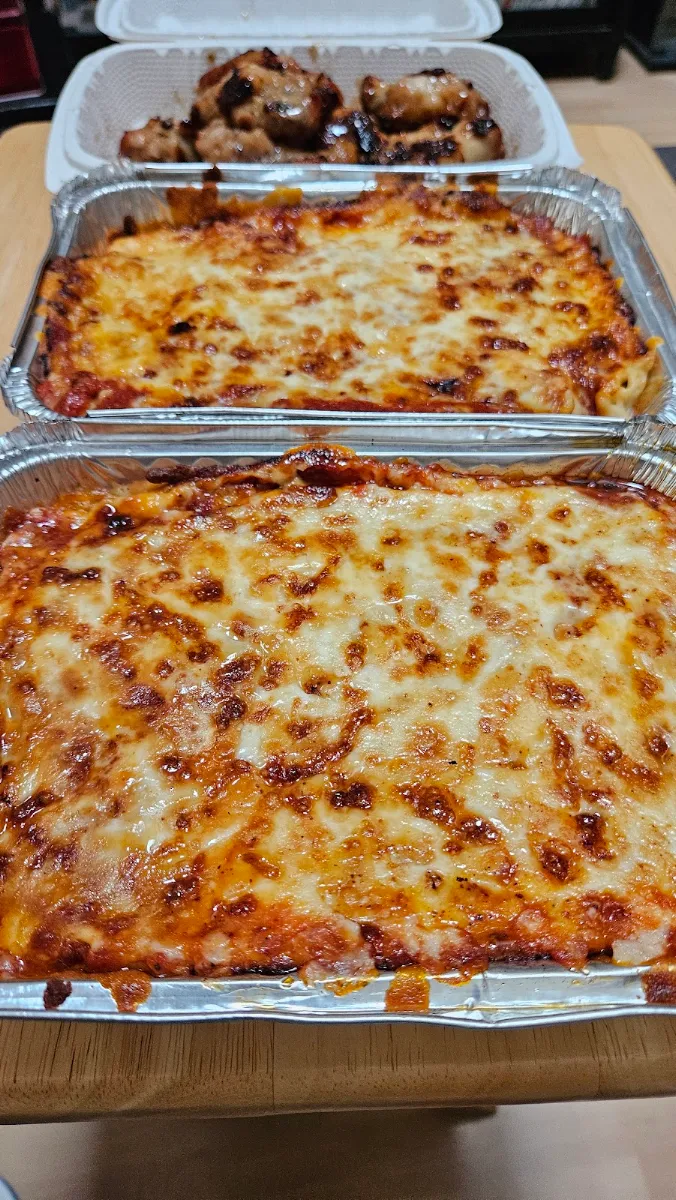 Large Baked Lasagna with Meat Sauce or Pizza Sauce Garlic Bread Included