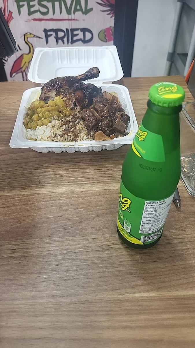 Oxtail w White Rice and Jersey Chicken w on Side Chicken Peas and Cold Slew