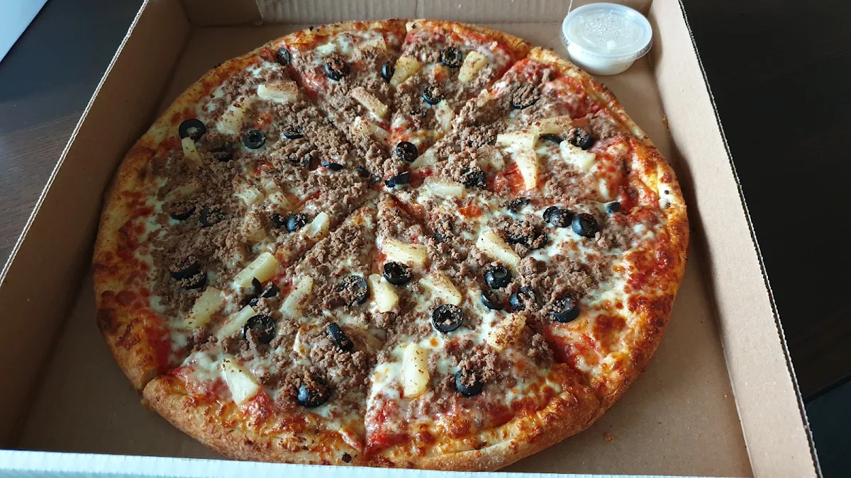 Large Pizza with Ground Beef Black Olive & Pineapple Toppings