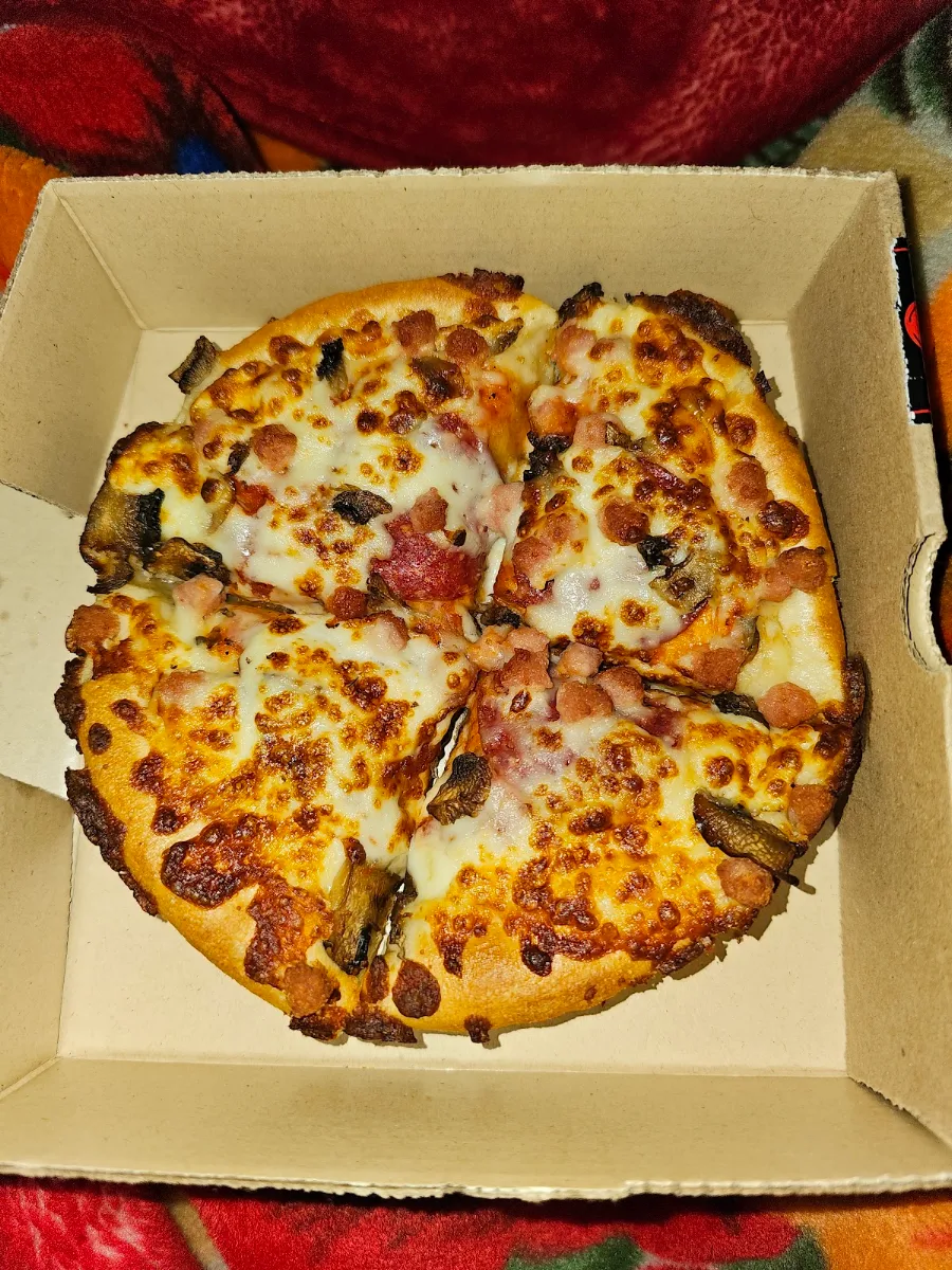 Person Pan Pizza Meat Lovers Pizza