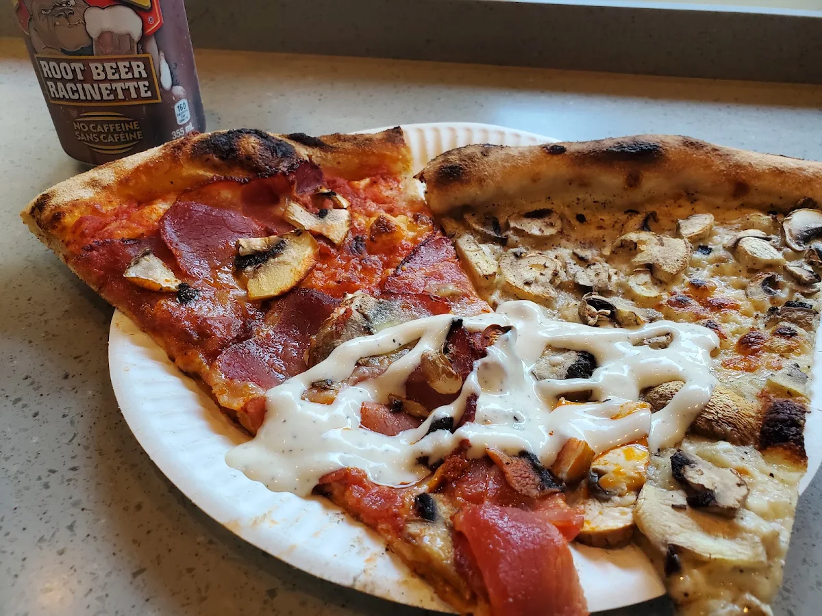 Two Pizza Slices and a Soda Pop