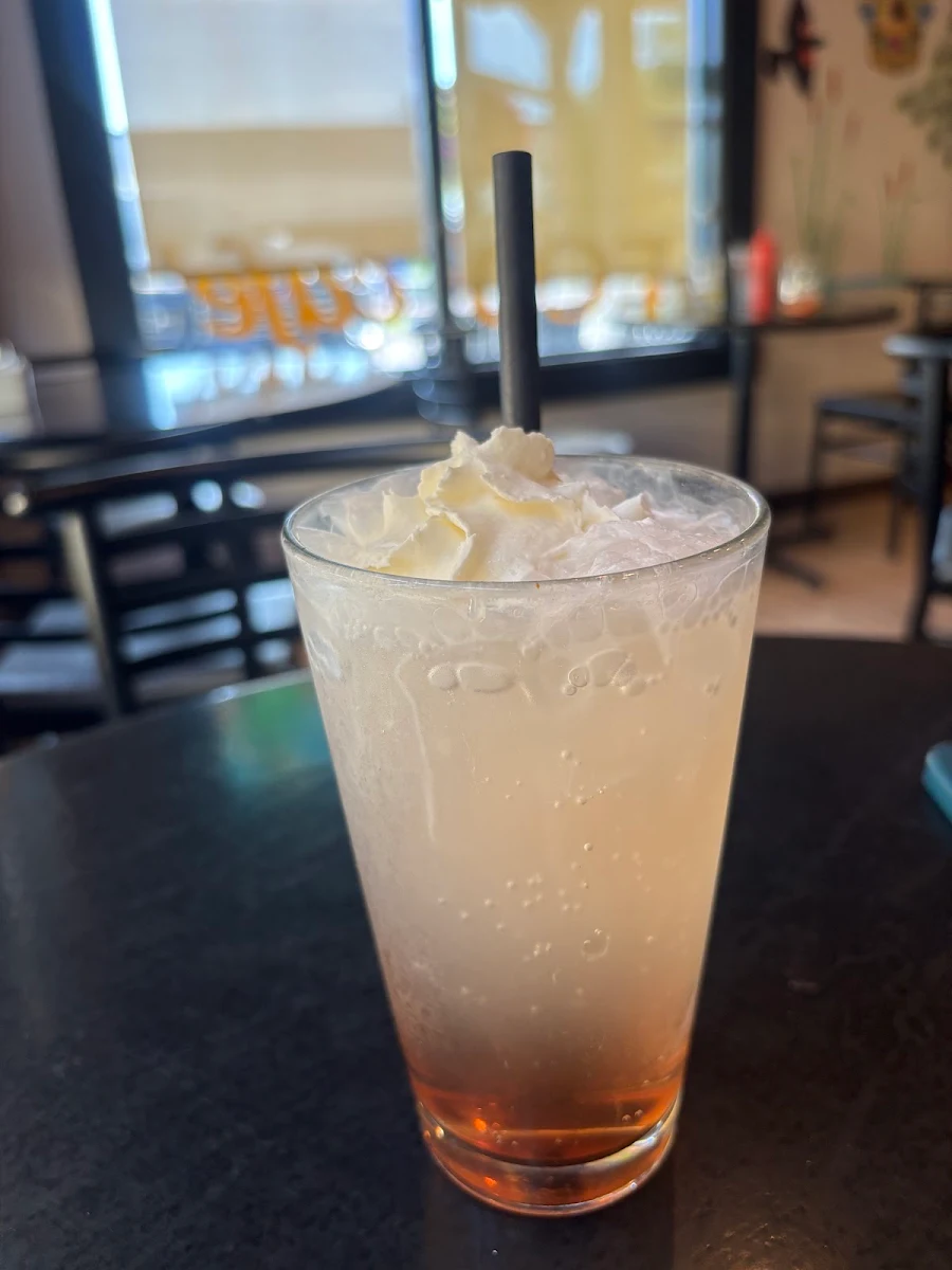 Mixed with Club Soda Topped with Whipped Cream