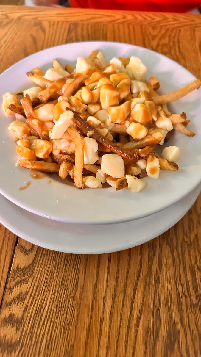 Poutine, Chez Lucien
