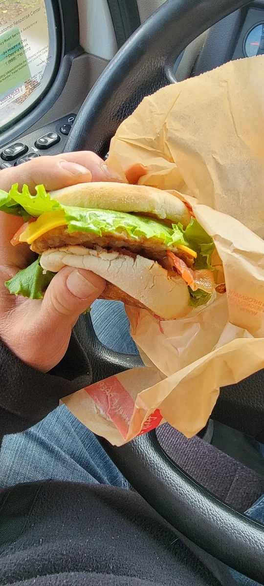 English Unfinished with Egg Sausage Bacon Lettuce Tomato and Chipotle Sauce