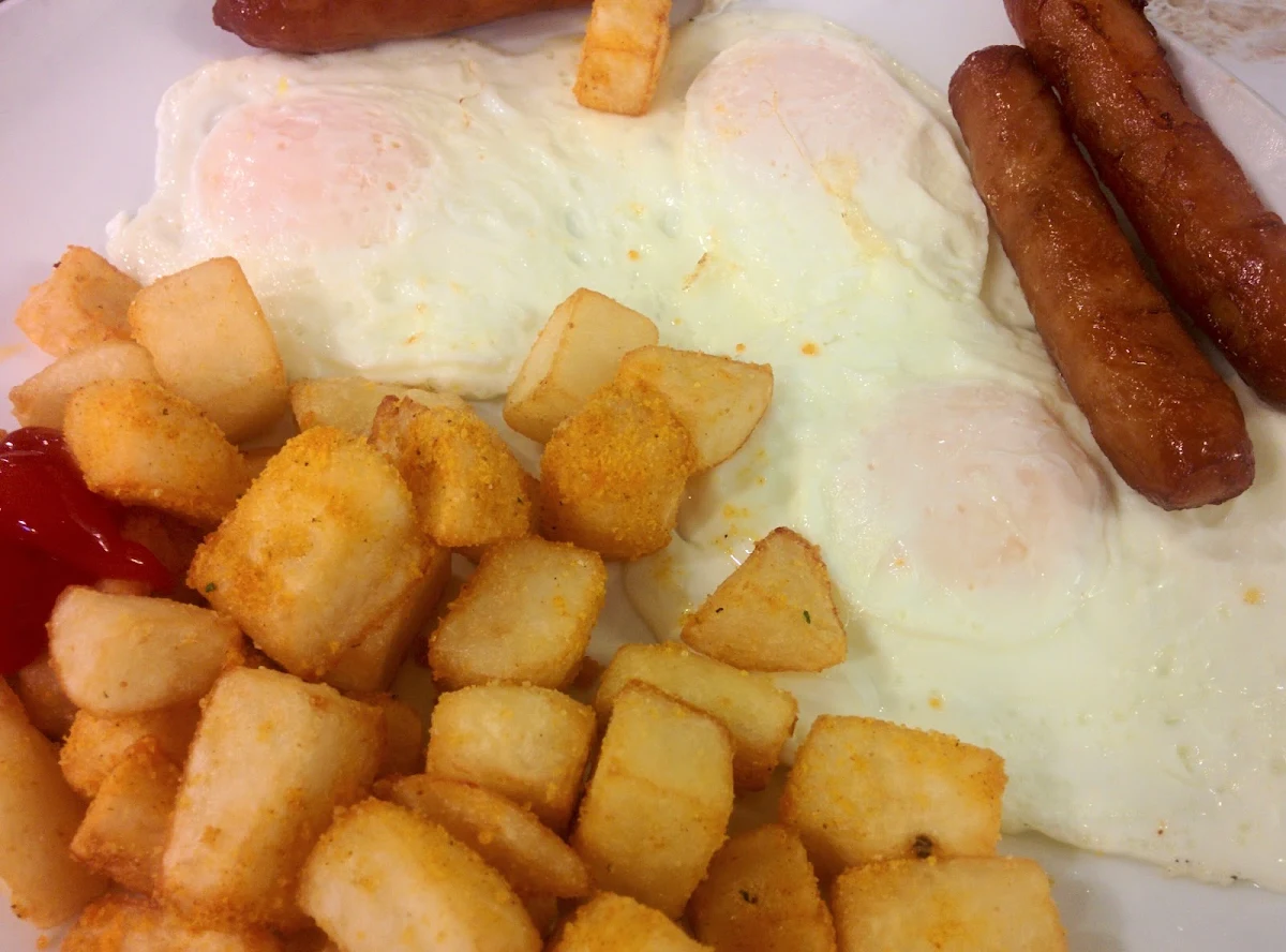 3 Eggs Sausage Hash Browns and Rye Toast