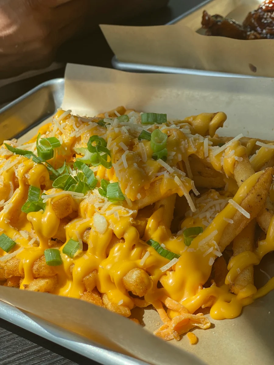 Cajun Tossed Cheesy Fries