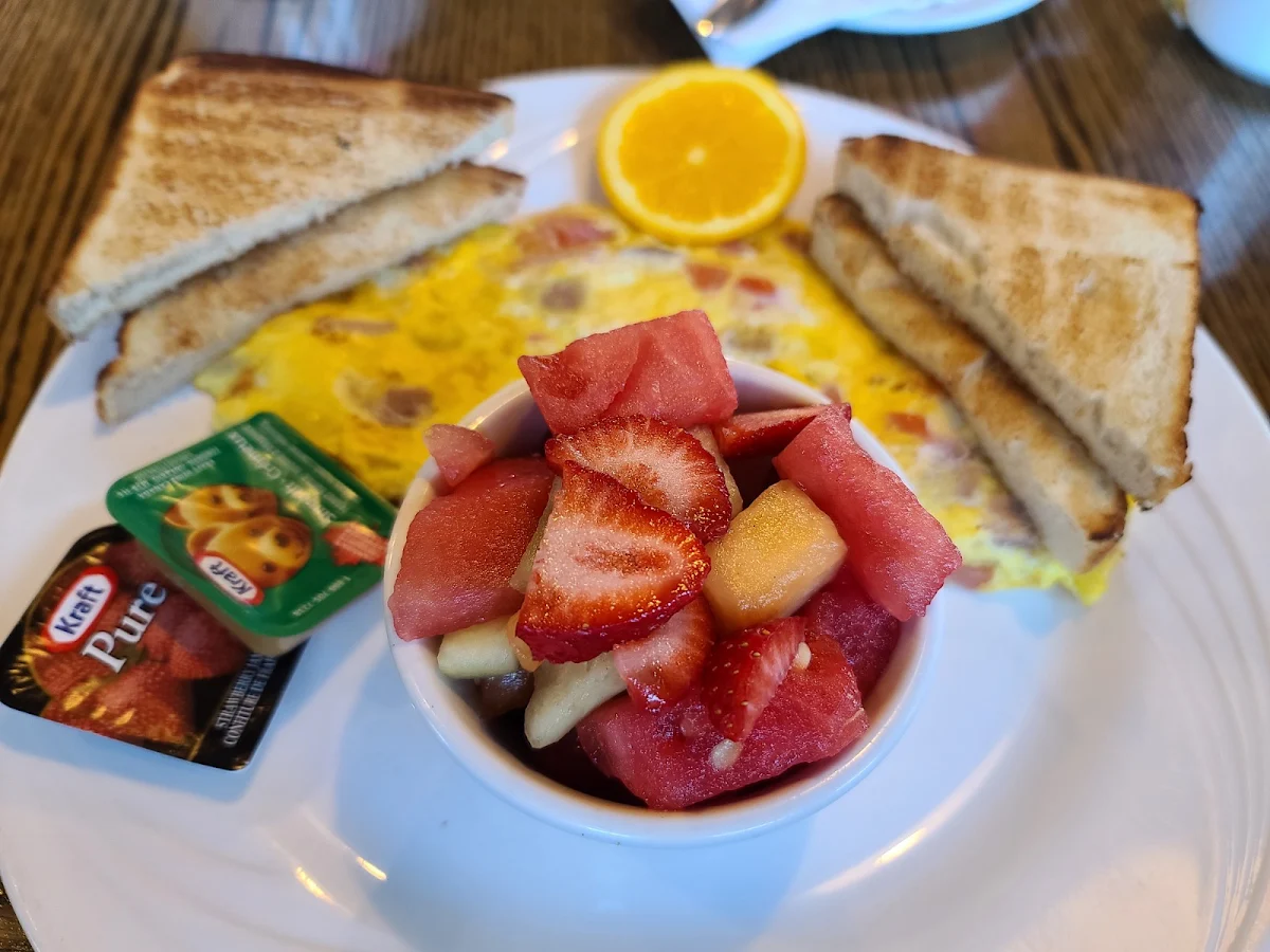 3 Egg Omelette with Tomatoes Swiss Cheese and Ham and Side Fruit Cup